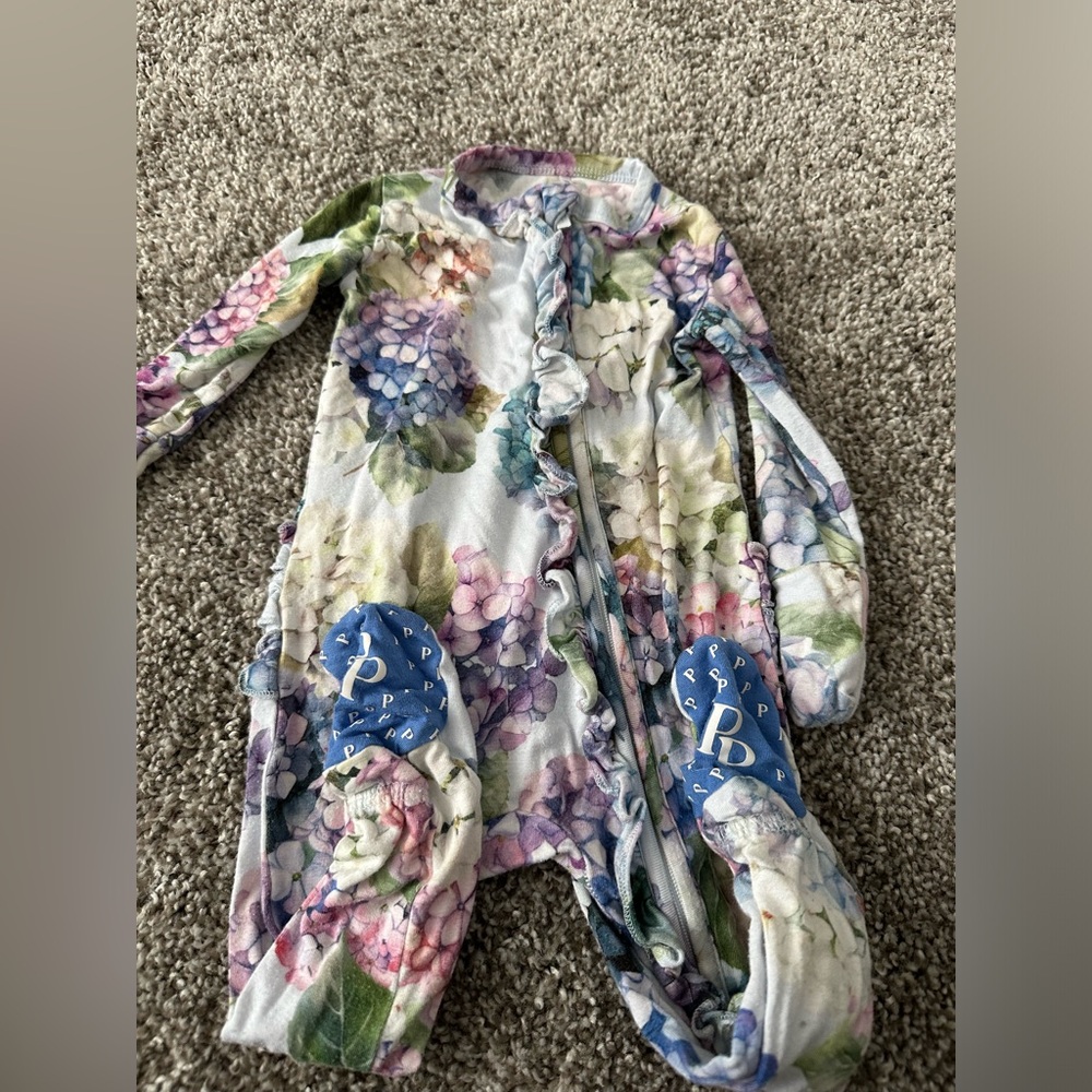 Posh Peanut blue floral onesie